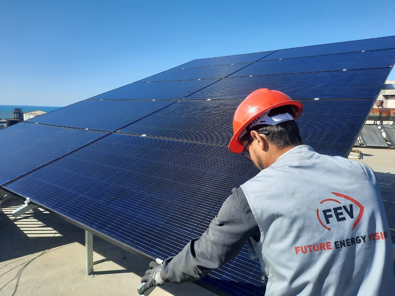 Future Energy Vision team installing solar panels