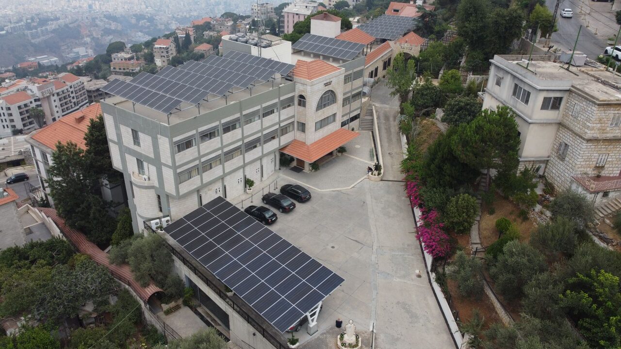 Rooftop solar PV installation overlooking Beirut, Lebanon